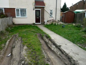before-old-grass-to-block-driveway